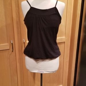 Black spaghetti strap top with broad support.